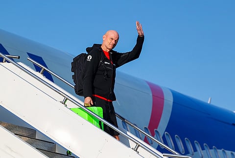 Norway's head coach Stale Solbakken gets off the plane after his national soccer team landed at Oslo Airport, in Gardermoen, Norway, Monday, July 13, 2026. 