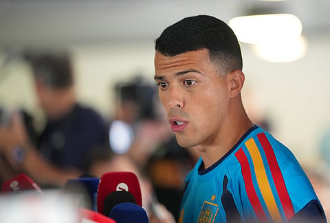 Spain's Pedro Porro speaks to reporters during a media session ahead of his team's semifinal soccer match against France, Monday, July 13, 2026, in Dallas. 
