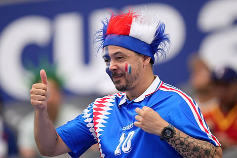 Fans wait in the stands prior to the World Cup semifinal soccer match between France and Spain in Arlington, Texas