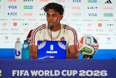 Spain's Lamine Yamal responds to a question during a news conference Monday, July 13, 2026, in Arlington, Texas, ahead of the team's World Cup semifinal soccer match against France. 
