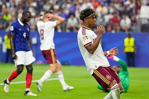 Spain's Lamine Yamal (19) reacts during the World Cup semifinal soccer match between France and Spain in Arlington, Texas
