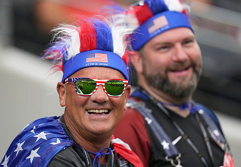 Fans wait in the stands prior to the World Cup semifinal soccer match between France and Spain in Arlington, Texas