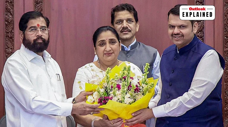 Maharashtra Chief Minister Devendra Fadnavis (R) Deputy Chief Minister Eknath Shinde (L) Deputy Chief Minister Sunetra Pawar (C) - | Photo: @CMOMaharashtra/X via PTI