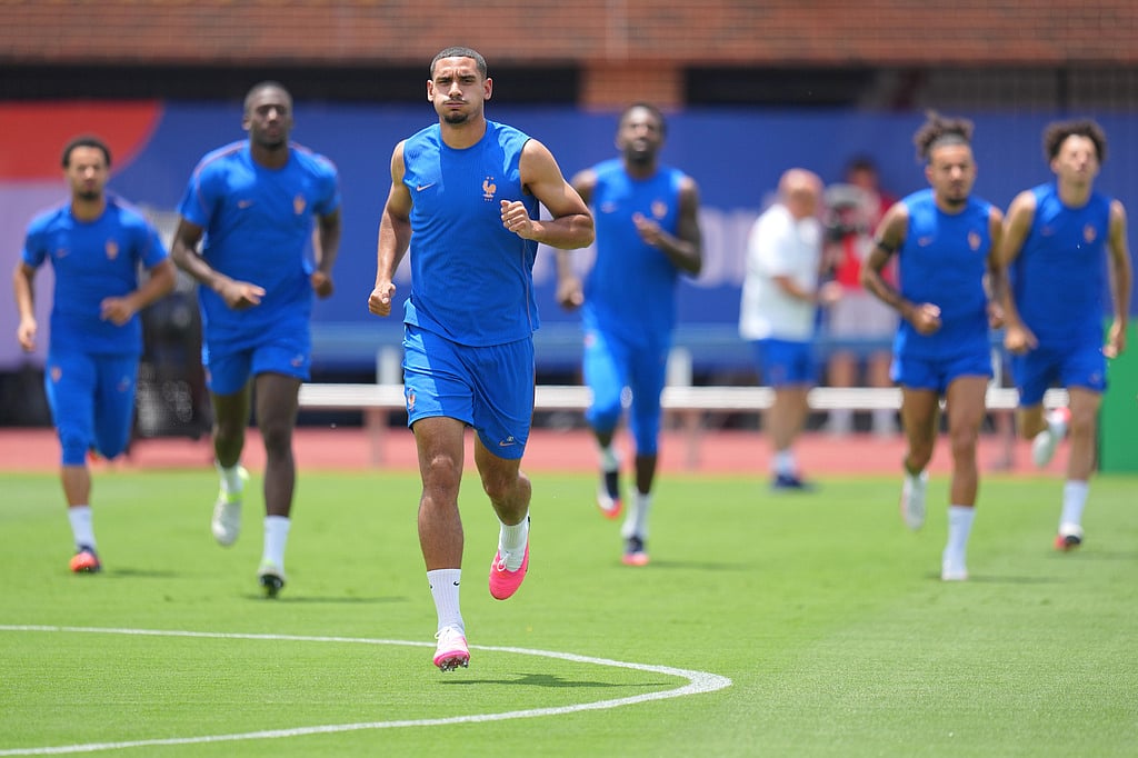 France's Maxence Lacroix participates in a training session ahead of the team's semifinal soccer match against Spain