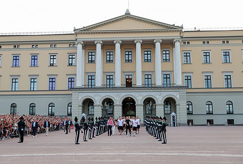 The men's national soccer team is applauded by a crowd at Slottsplassen after attending a reception with Norway's royal family, in Oslo, Monday, July 13, 2026. 