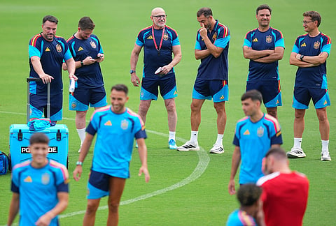 Spain head coach Luis de la Fuente, top center, looks on as his players participate in a training session ahead of his team's semifinal soccer match against France, Monday, July 13, 2026, in Dallas. 