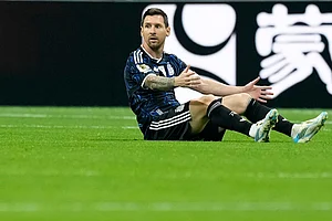 AP : Argentina's Lionel Messi on the floor during the World Cup semifinal soccer match