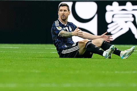 Argentina's Lionel Messi on the floor during the World Cup semifinal soccer match