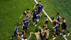 Argentina's Lautaro Martinez (22) celebrates with teammates after scoring their second goal during the World Cup semifinal - AP/Mike Stewart