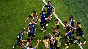 AP/Mike Stewart : Argentina's Lautaro Martinez (22) celebrates with teammates after scoring their second goal during the World Cup semifinal