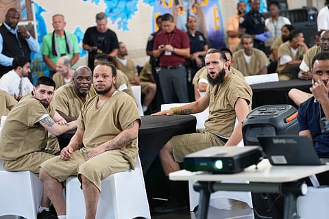 Rikers Island inmates react as they watch the World Cup semifinal soccer match between England and Argentina
