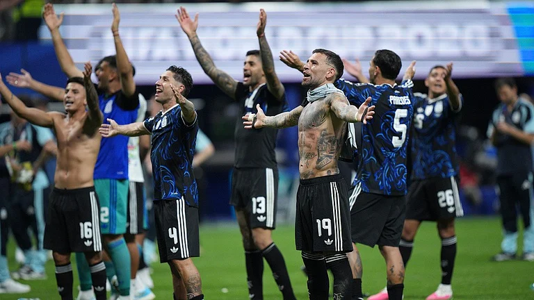 Argentina players react to the fans after their win in the World Cup semifinal soccer match between England and Argentina in Atlanta. - Jacob Kupferman/AP Photo