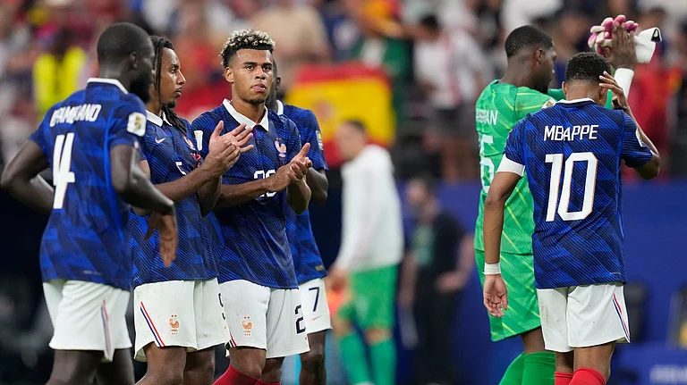 France players applaud after the World Cup semifinal soccer match between France and Spain in Arlington, Texas - AP