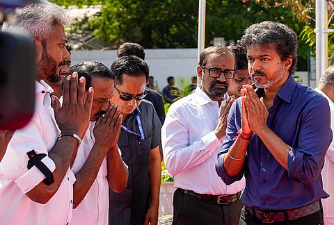 Tamil Nadu Chief Minister C Joseph Vijay being greeted during a tribute ceremony of former state chief minister K Kamaraj on his birth anniversary, in Chennai, Tamil Nadu.