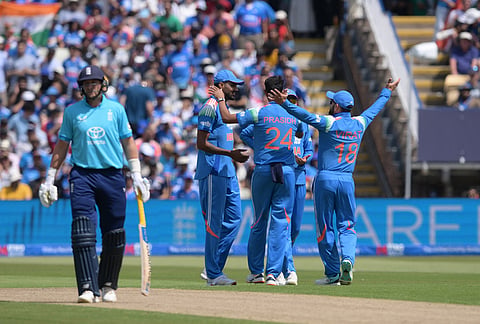 India's Gurnoor Brar, rear left, celebrates catching out England's Jos Buttler during the First Metro Bank ODI cricket match between England and India in Birmingham, England, Tuesday, July 14, 2026. 