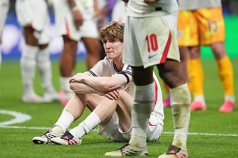 England's Anthony Gordon (18) reacts after the World Cup semifinal soccer match between England and Argentina in Atlanta