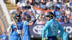 India's Axar Patel celebrates his fifty during the first ODI cricket match between England and India in Birmingham, England, Tuesday, July 14, 2026. - (Gary Oakley/PA via AP)