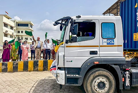 British Deputy High Commissioner to Gujarat and Rajasthan Steve Hickling flags off container trucks during an event marking the India-UK Comprehensive Economic and Trade Agreement (CETA), at Sanand, in Ahmedabad district, Gujarat.
