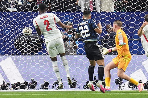 Argentina's Lautaro Martinez (22) scores their second goal during the World Cup semifinal soccer match