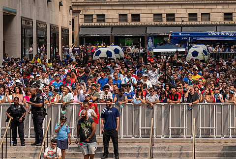 Fans watch the World Cup semifinal soccer match between Spain and France at a watch party at the Rockefeller Center fan village, Tuesday, July 14, 2026, in New York. 