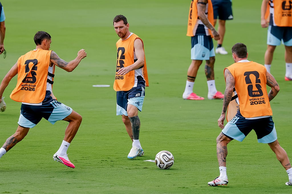 Argentina's Lionel Messi, center, participates in a training session the day before the World Cup semifinal soccer match between Argentina and England in Marietta