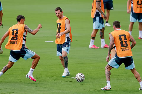 Argentina's Lionel Messi, center, participates in a training session the day before the World Cup semifinal soccer match between Argentina and England in Marietta
