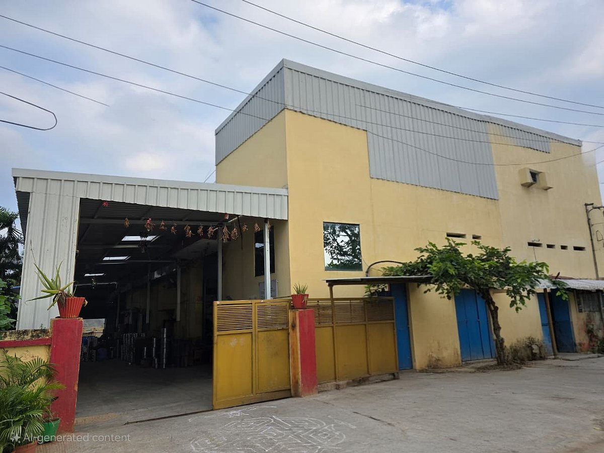 Yellow industrial building with blue doors
