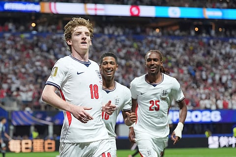 England's Anthony Gordon (18) celebrates after scoring the opening goal during the World Cup semifinal soccer match