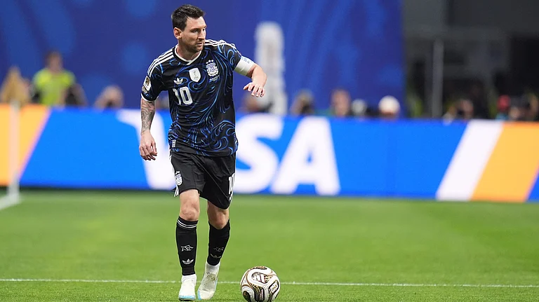 Argentina's Lionel Messi (10) controls the ball during the World Cup semifinal soccer match between England and Argentina - AP/Jeff Roberson