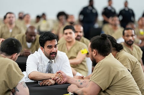 New York City Mayor Zohran Mamdani speaks with Rikers Island inmates as they watch the World Cup semifinal soccer match between England and Argentina, at the jail complex in New York