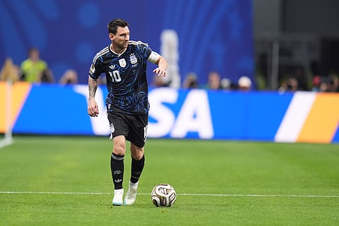 Argentina's Lionel Messi (10) controls the ball during the World Cup semifinal soccer match between England and Argentina