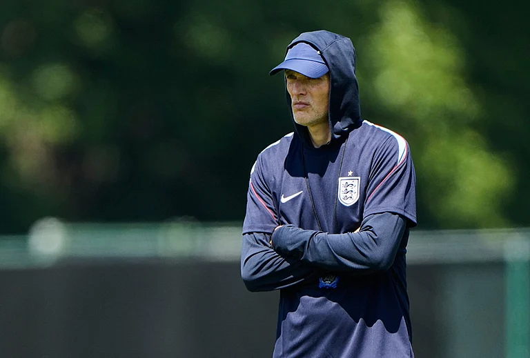 England head coach Thomas Tuchel watches training for the World Cup soccer tournament Tuesday, July 14, 2026, in Kansas City, Missouri. - | Photo: AP/Charlie Riedel