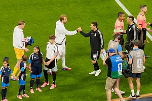 AP : England's Harry Kane, center left, and Argentina's Lionel Messi greet each other before their World Cup semifinal soccer
