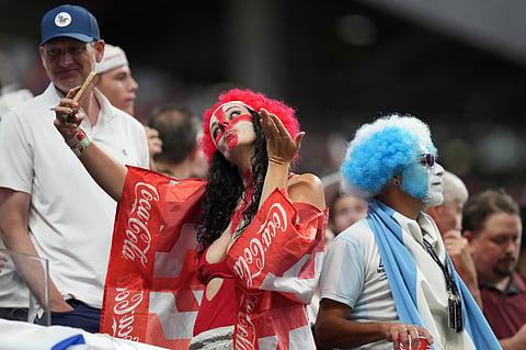 A fan takes a selfie before the World Cup semifinal soccer match between England and Argentina in Atlanta, Wednesday