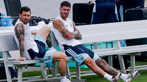 Argentina's Lionel Messi, left, and Rodrigo De Paul, right, wait for the start of a training session the day before the World Cup semifinal soccer match between Argentina and England in Marietta, Ga., Tuesday, July 14, 2026.