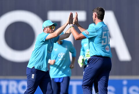 England's Josh Tongue, right, celebrates the wicket of India's KL Rahul during the first ODI cricket match between England and India in Birmingham, England, Tuesday, July 14, 2026. 
