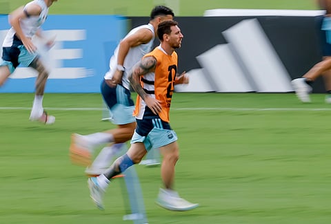 Argentina's Lionel Messi, center, jogs during in a training session the day before the World Cup semifinal soccer match between Argentina and England in Marietta, Ga., Tuesday, July 14, 2026. 
