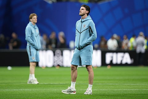 England's Declan Rice (4) arrives on the field before the World Cup semifinal soccer match between England and Argentina in Atlanta