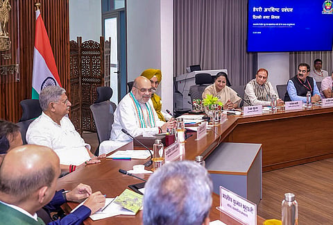 Union Ministers Amit Shah, Rajiv Ranjan (Lalan) Singh, Delhi CM Rekha Gupta and Delhi LG Taranjit Singh Sandhu during the MoU signing between MCD and NDDB for the establishment of Compressed Bio-Gas (CBG) plants for the scientific utilisation of cattle dung in Delhi. 