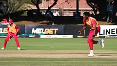 Zimbabwe's bowler Richard Ngarava, right, reacts after his delivery during the 1st T20 day cricket match between Zimbabwe and Bangladesh in Bulawayo, Zimbabwe, Wednesday, July 15, 2026 - (AP Photo/Mkhululi Thobela)