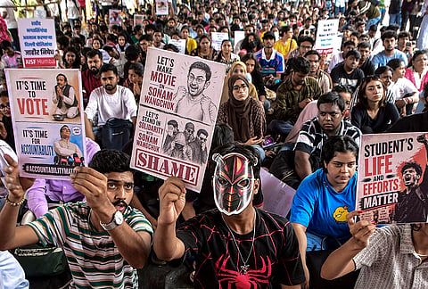 People participate in a protest at Azad Maidan demanding a transparent, accountable and corruption-free examination system, and seeking the resignation of Union Education Minister Dharmendra Pradhan over the NEET paper leak case, in Mumbai.