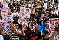 Mumbai Police Use Live Location Tracking and Home Visits to Deter Young CJP Protesters | Photo: PTI : People participate in a protest at Azad Maidan demanding a transparent, accountable and corruption-free examination system, and seeking the resignation of Union Education Minister Dharmendra Pradhan over the NEET paper leak case, in Mumbai.
