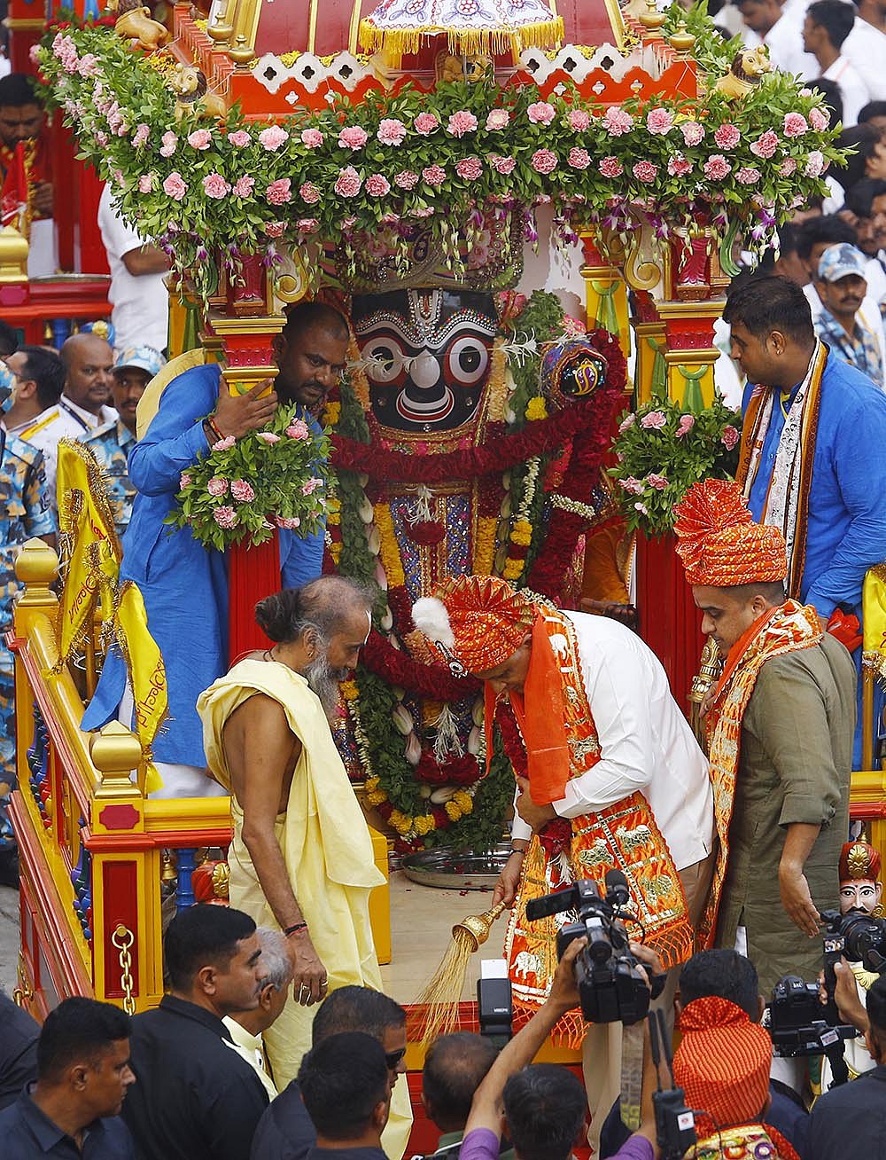 Gujarat Chief Minister Bhupendra Patel and Deputy CM Harsh Sanghavi performs rituals as people pull chariots of Lord Jagannath, Lord Balabhadra and Goddess Subhadra on the occasion of the Rath Yatra festival, in Ahmedabad, Thursday, July 16, 2026. 