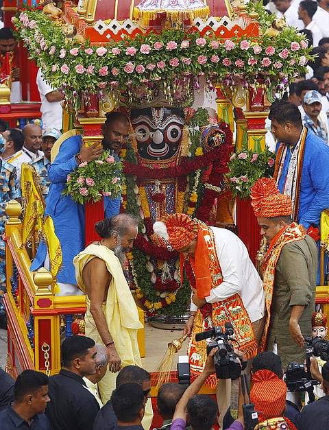 Gujarat Chief Minister Bhupendra Patel and Deputy CM Harsh Sanghavi performs rituals as people pull chariots of Lord Jagannath, Lord Balabhadra and Goddess Subhadra on the occasion of the Rath Yatra festival, in Ahmedabad, Thursday, July 16, 2026. 