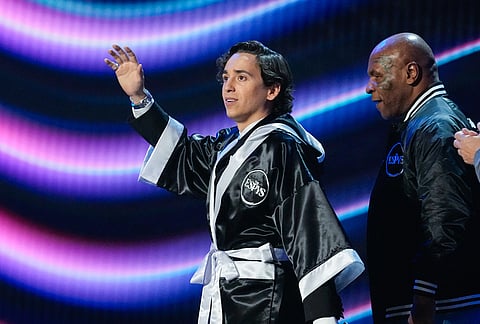 Host Marcello Hernández, left, walks out with Mike Tyson at the ESPY Awards in the David H. Koch Theater at Lincoln Center Wednesday, July 15, 2026, in New York. 