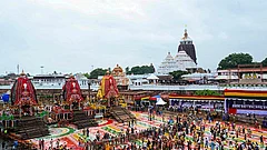 People gather near chariots of Lord Jagannath, Lord Balabhadra and Goddess Subhadra on the occasion of the Rath Yatra festival, in Puri, Odisha, Thursday, July 16, 2026. - | Photo: PTI