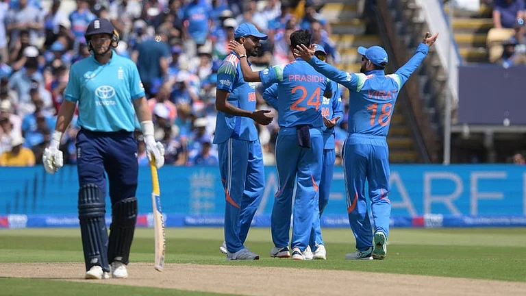 India's Gurnoor Brar, rear left, celebrates catching out England's Jos Buttler during the First Metro Bank ODI cricket match between England and India in Birmingham, England, Tuesday, July 14, 2026. - | Photo: Gary Oakley/PA via AP