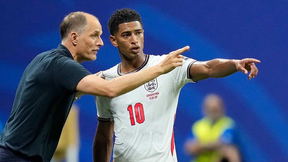 England head coach Thomas Tuchel talks to England's Jude Bellingham during the World Cup semifinal soccer match - AP/Rebecca Blackwell