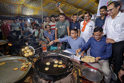 Gujarat Deputy Chief Minister Harsh Sanghavi during a visit to a 'Bhandara', community kitchen, ahead of the Rath Yatra festival, at Saraspur area, in Ahmedabad. 
