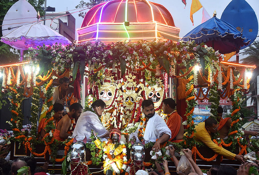 People pull a chariot carrying idols of Lord Jagannath, Lord Balabhadra and Goddess Subhadra on the occasion of the Rath Yatra festival, in Varanasi, Uttar Pradesh, Thursday, July 16, 2026. 